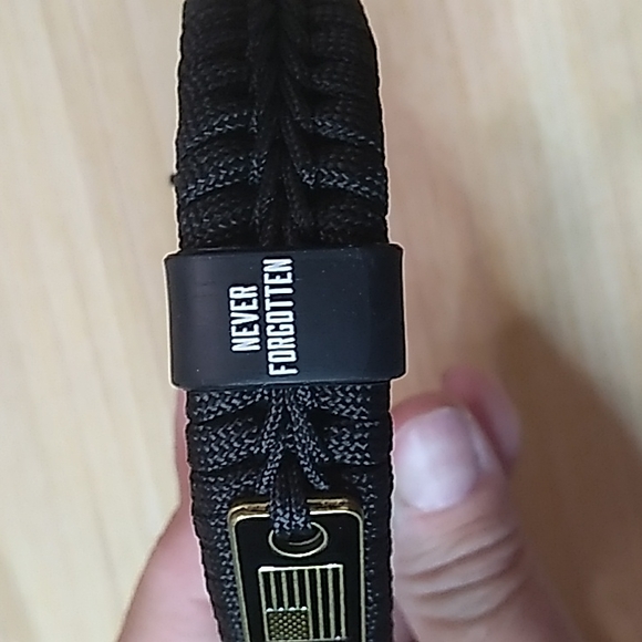 9-10 inches black bracelet emergency cord w Metal flag & never forget on it - Picture 3 of 5